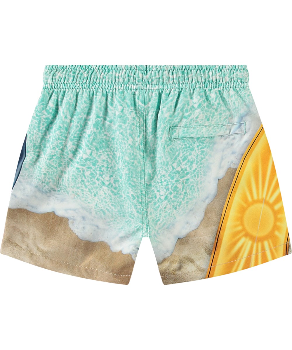 Niko - Surf Art - Sportiga badshorts för aktiva barn i återvunnen polyester med UV-skydd 50+.