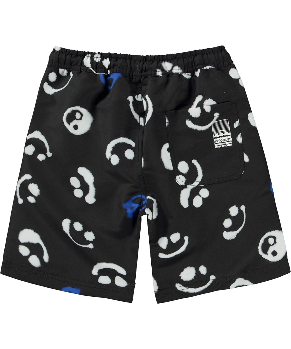 Nilson - Blue Signs - Svarta badshorts med långa ben och akvarellmönster