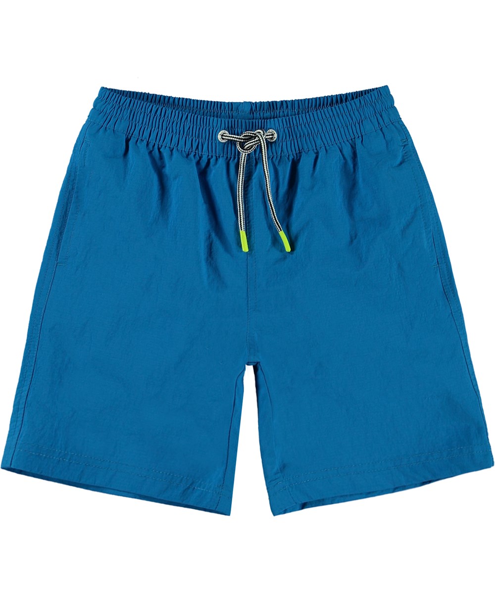 Nilson Solid - Retro Blue - Blå badshorts med långa ben.