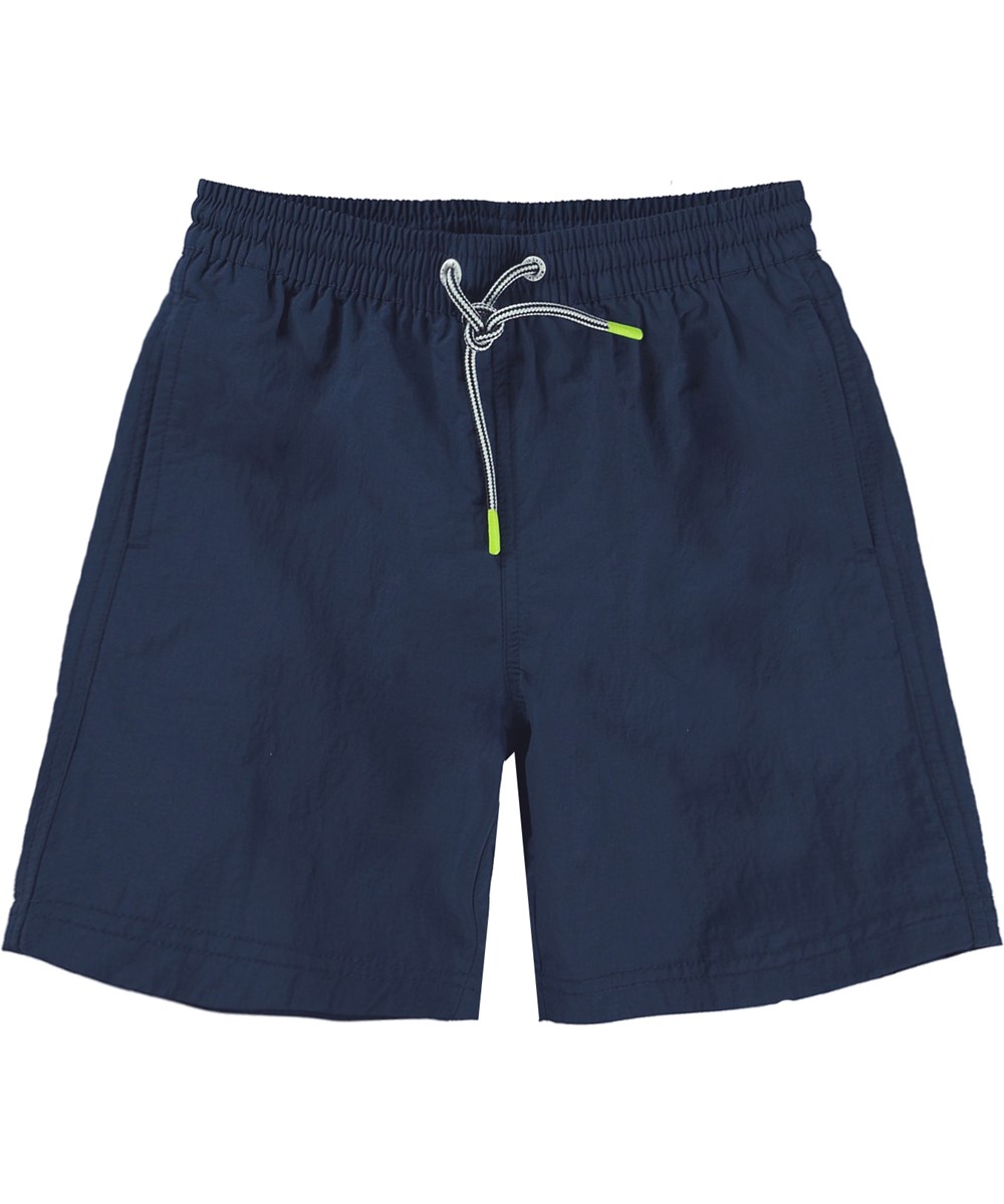 Nilson Solid - Universe - Blå badshorts med långa ben.