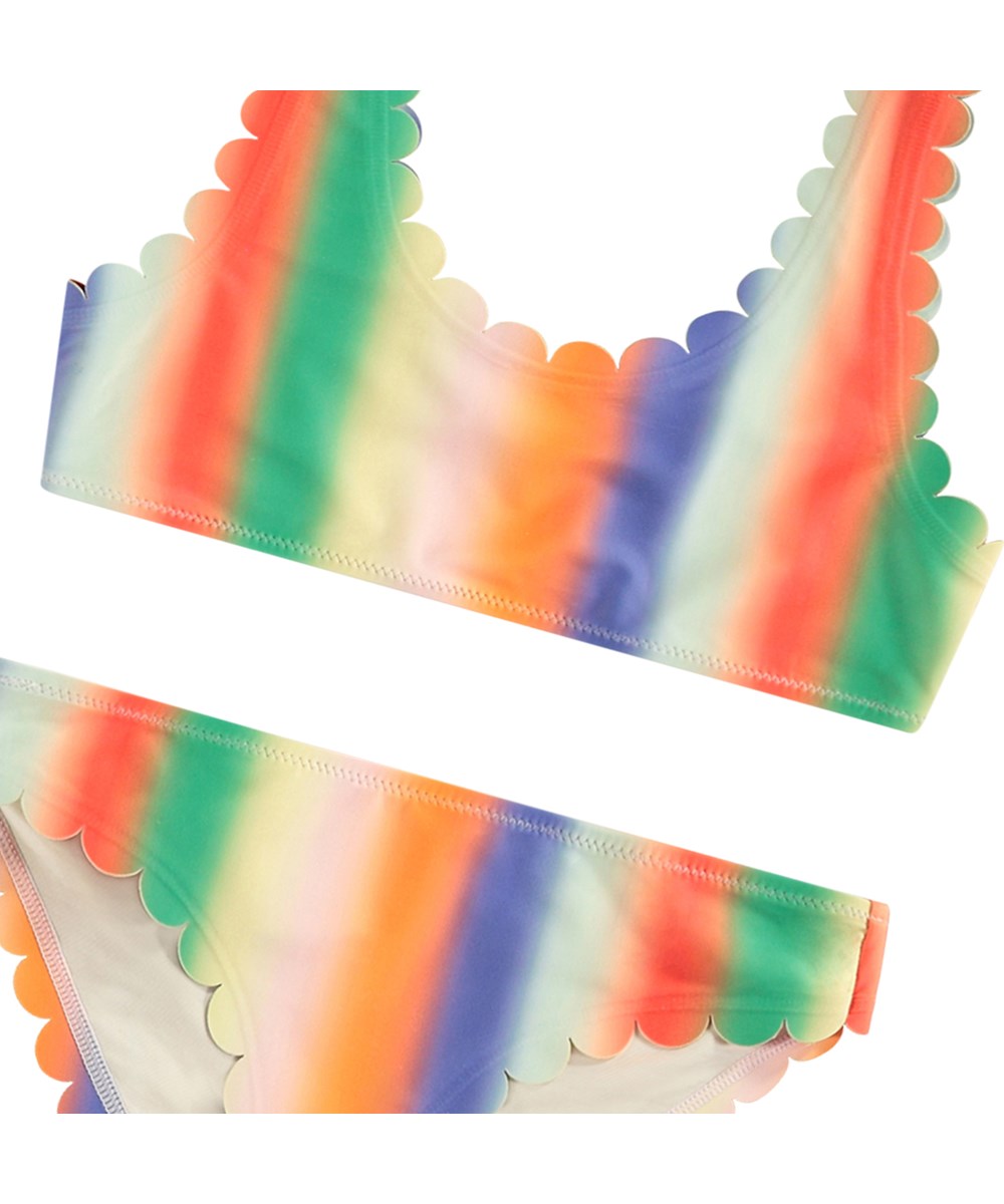Nolina - Rainbow Light - Regnbågsfärgad bikini för aktiva barn tillverkad av återvunnen polyester med UV-skydd 50+.