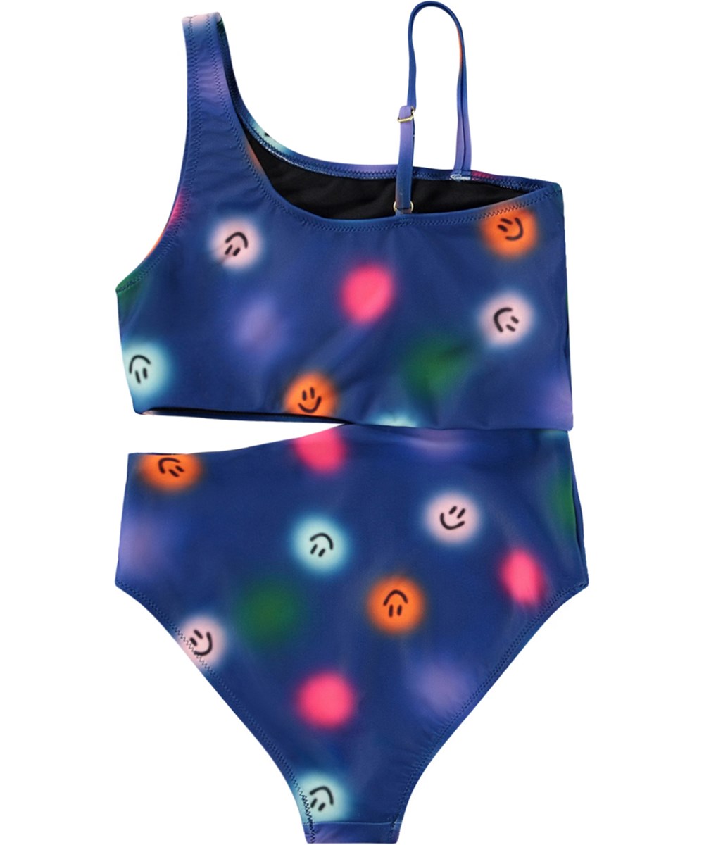 Naan - Smile Bright - Blauwe badpak van gerecycled polyester met UV-bescherming 50+ gemaakt voor actieve kinderen.