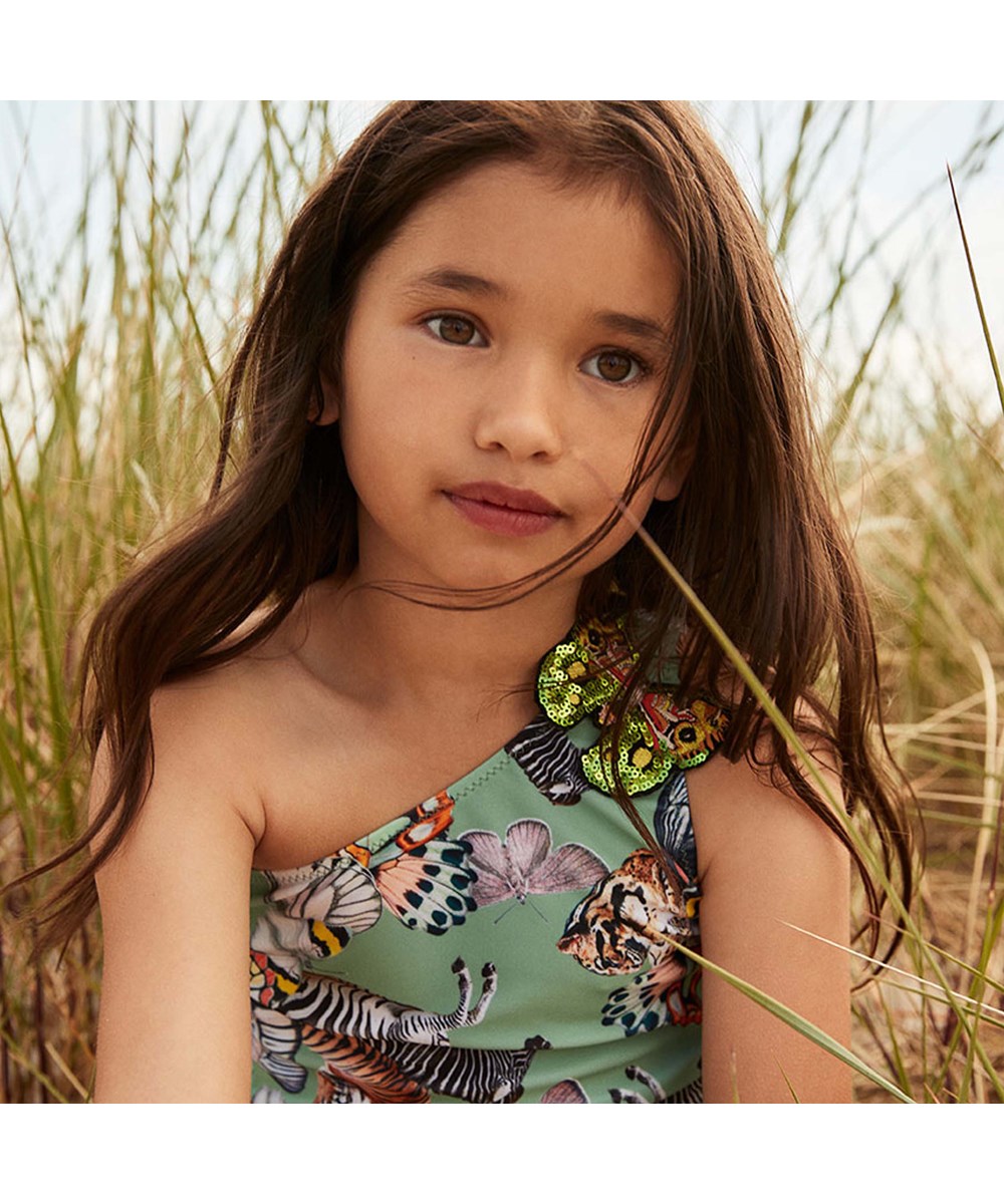 Nai - Summer Twist - UV asymmetrische badpak met wilden dieren