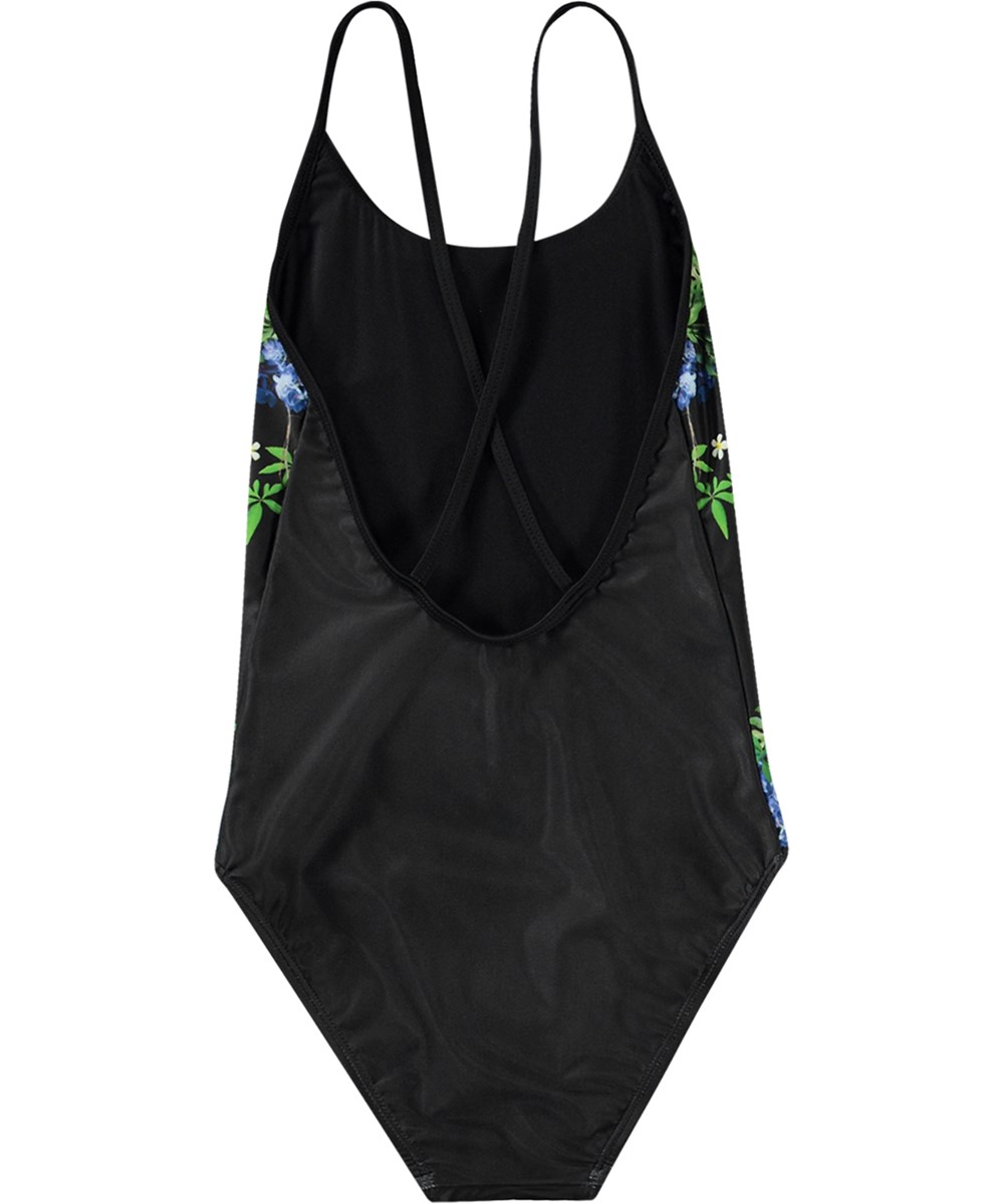 Nanna - Magic World - Zwarte badpak van gerecycled polyester met UV-bescherming 50+ gemaakt voor actieve kinderen.