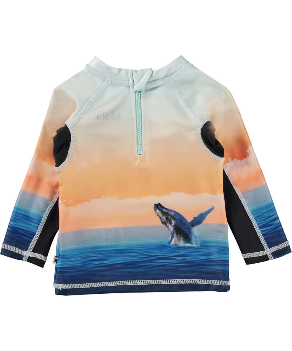 Nemo - Ocean Smile - Blauwe en oranje baby zwemshirt met oceaanprint