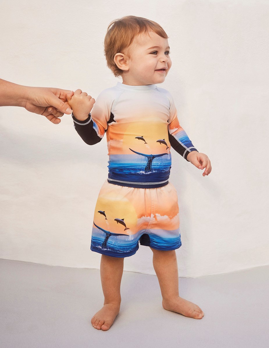 Nemo - Ocean Smile - Blauwe en oranje baby zwemshirt met oceaanprint