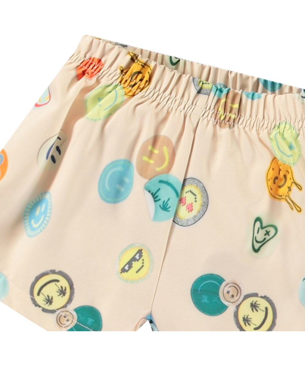 Newton - Sand Smile - Baby zwemshort van gerecycled polyester met UV-bescherming 50+.