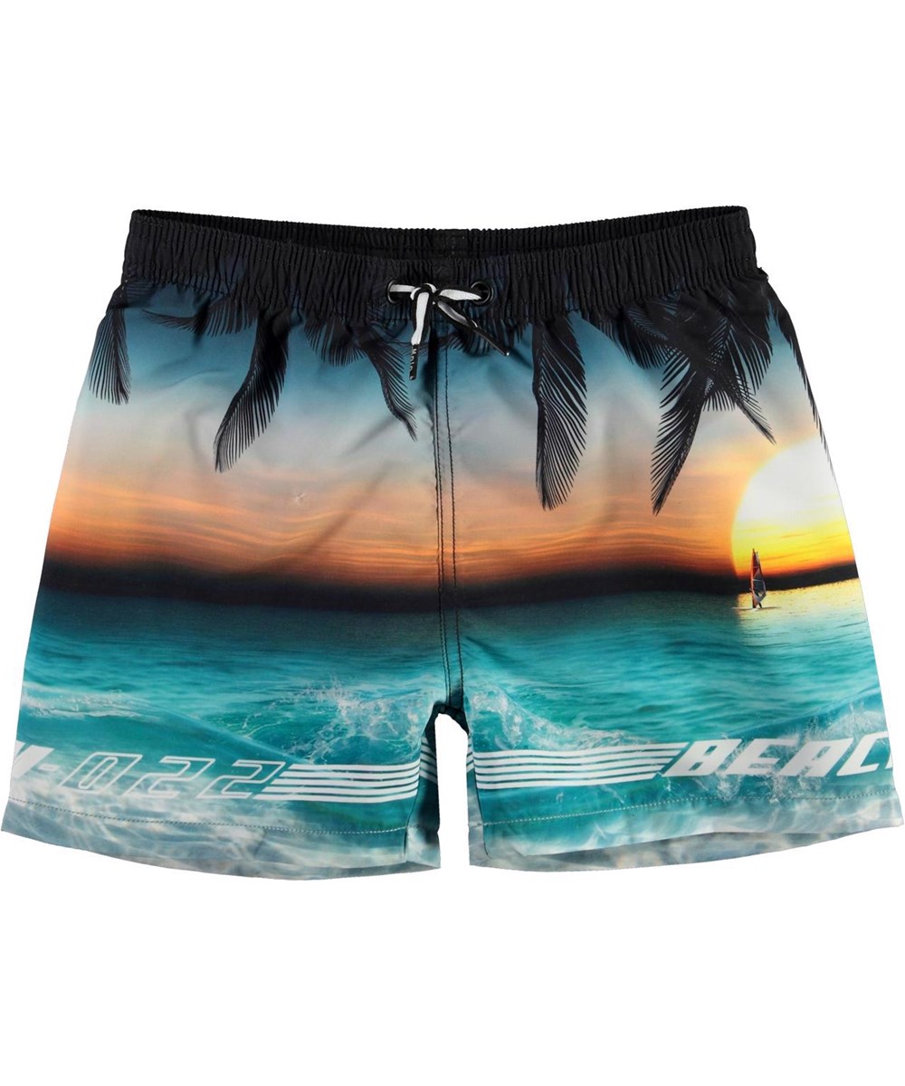 Niko - Sunset - UV zwemshort met zonsondergang en palmbomen