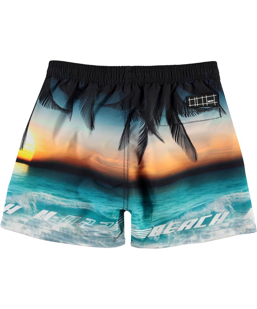 Niko - Sunset - UV zwemshort met zonsondergang en palmbomen