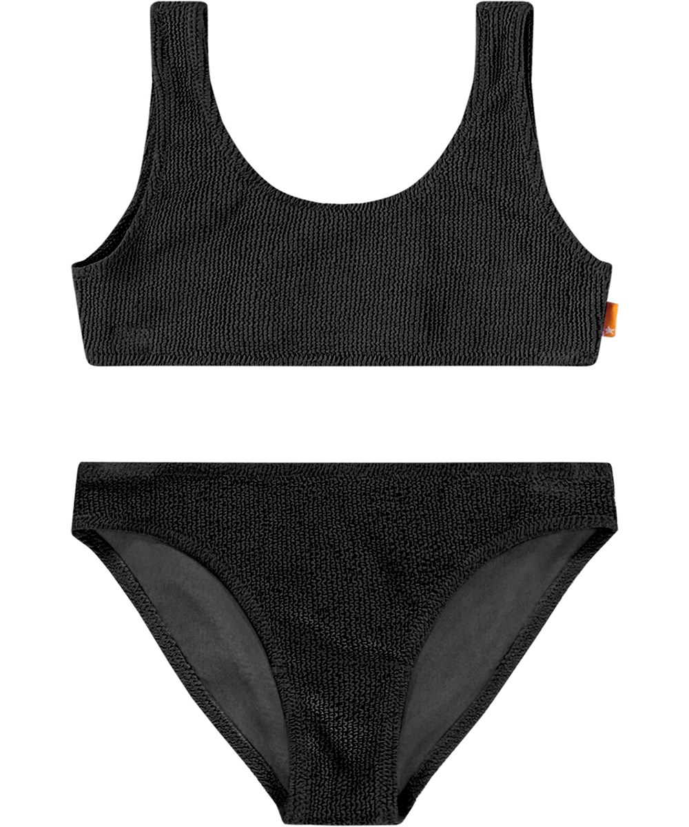 Nola Solid - Black - Elastische zwarte bikini voor kinderen in een reliëfpatroon met UV-bescherming 50+.