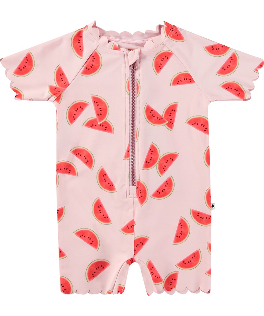 Nolu - Melon Pink - Roze badpak met korte mouwen en pijpen van gerecycled polyester en UV-bescherming 50+ gemaakt voor kinderen.