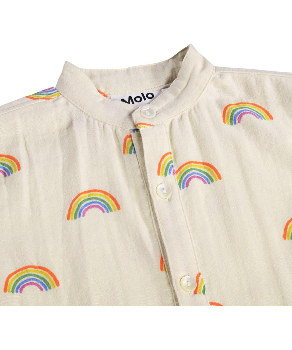 Falkone - Small Rainbows - Krämfärgad romper för de små i ekologisk bomull med regnbågsmönster