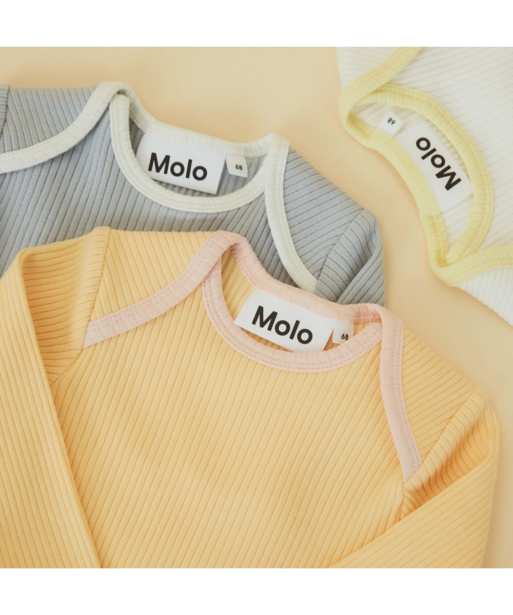 Faros - White Star - Ekologisk ribbad body i vit och gul.