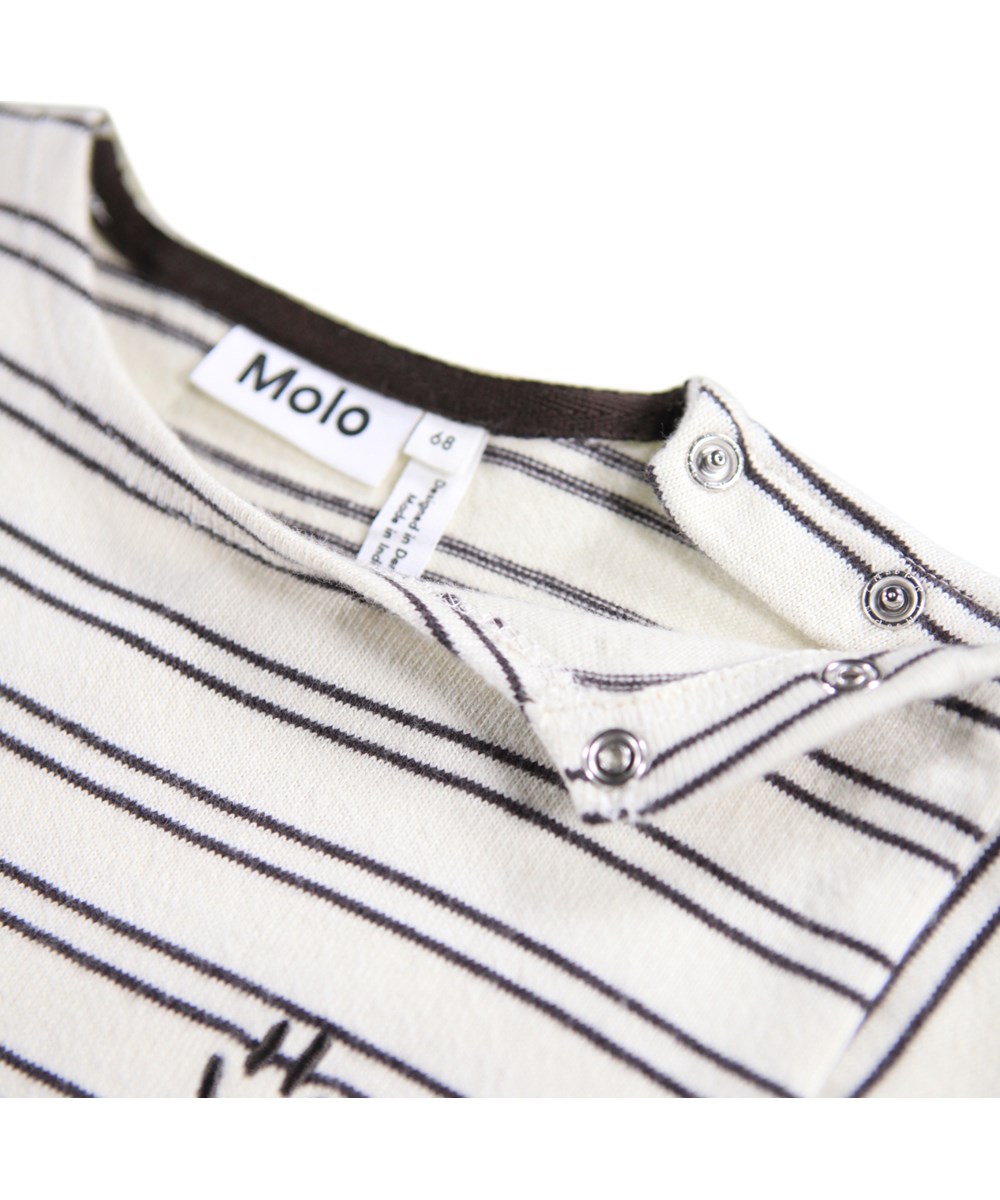 Flint - Cocoa Stripe - Heldräkt i ekologisk bomull for baby, med rander i bruna nyanser.