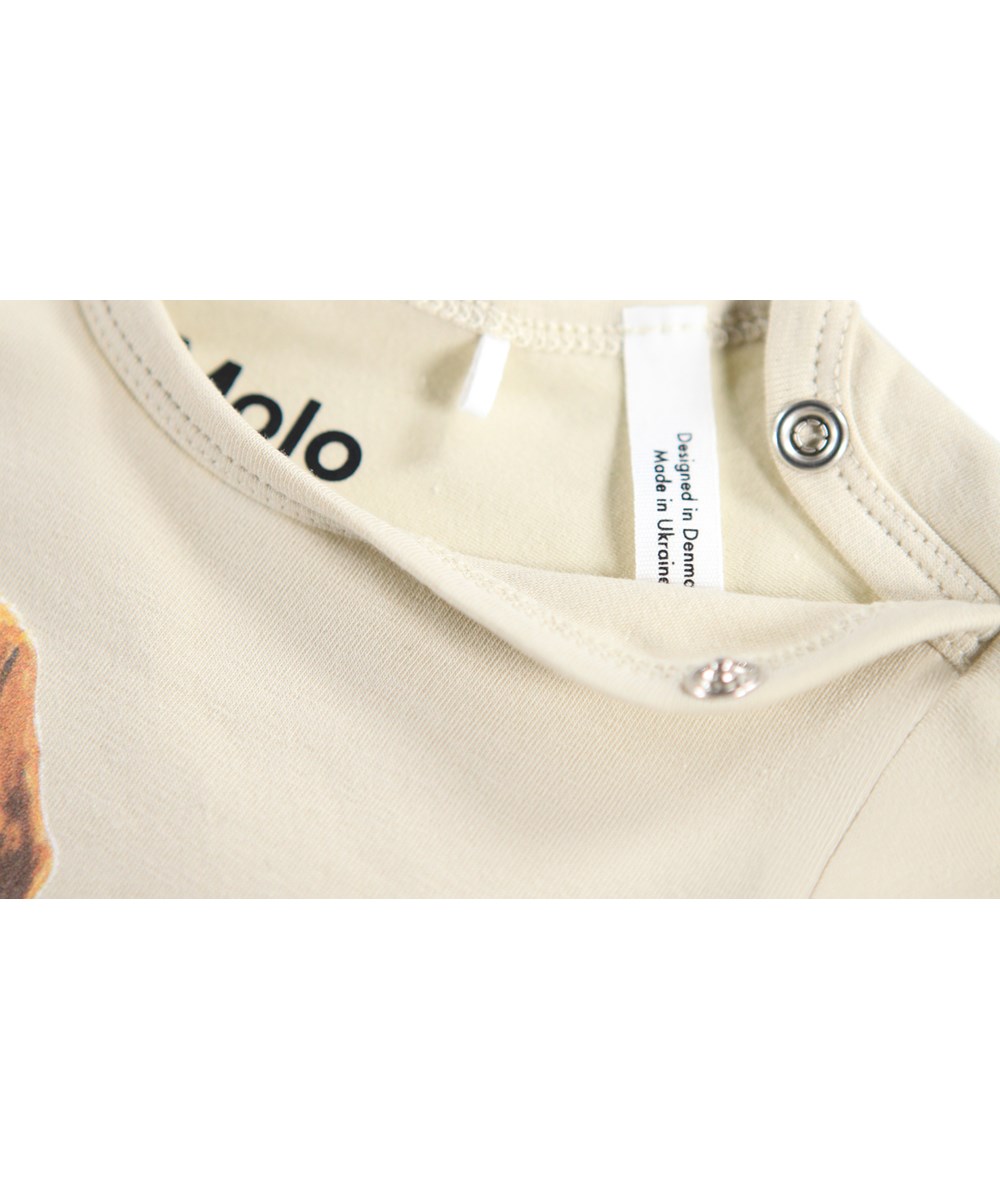 Foss - Doggy Portrait - Beige långärmad body i ekologisk bomull för baby med två taxar.