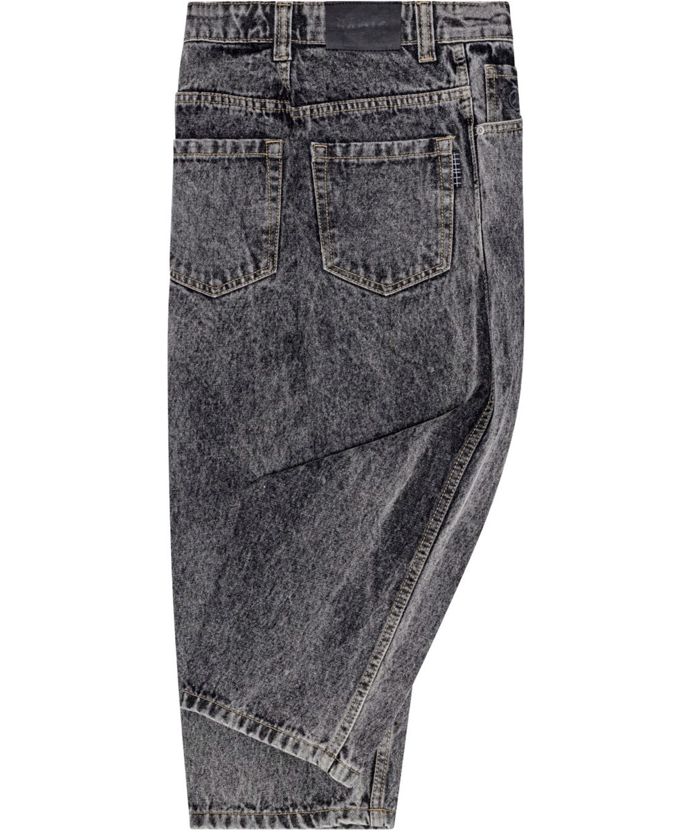 Aska - Black Stone - Mörkgråa, oversized jeans med ett peacemärke och justerbar midja.