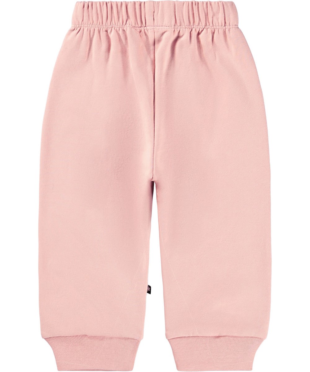 Simeon - Rose Cloud - Mjuka rosa byxor för baby i ekologisk bomull med mjuka vita ansikten på knäna.