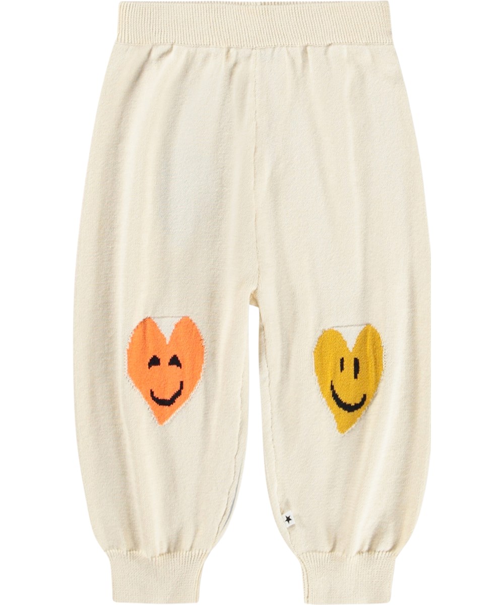 Solana - Heart Vibes - Mjuka, vita stickade byxor för de små i ekologisk bomull med hjärtan