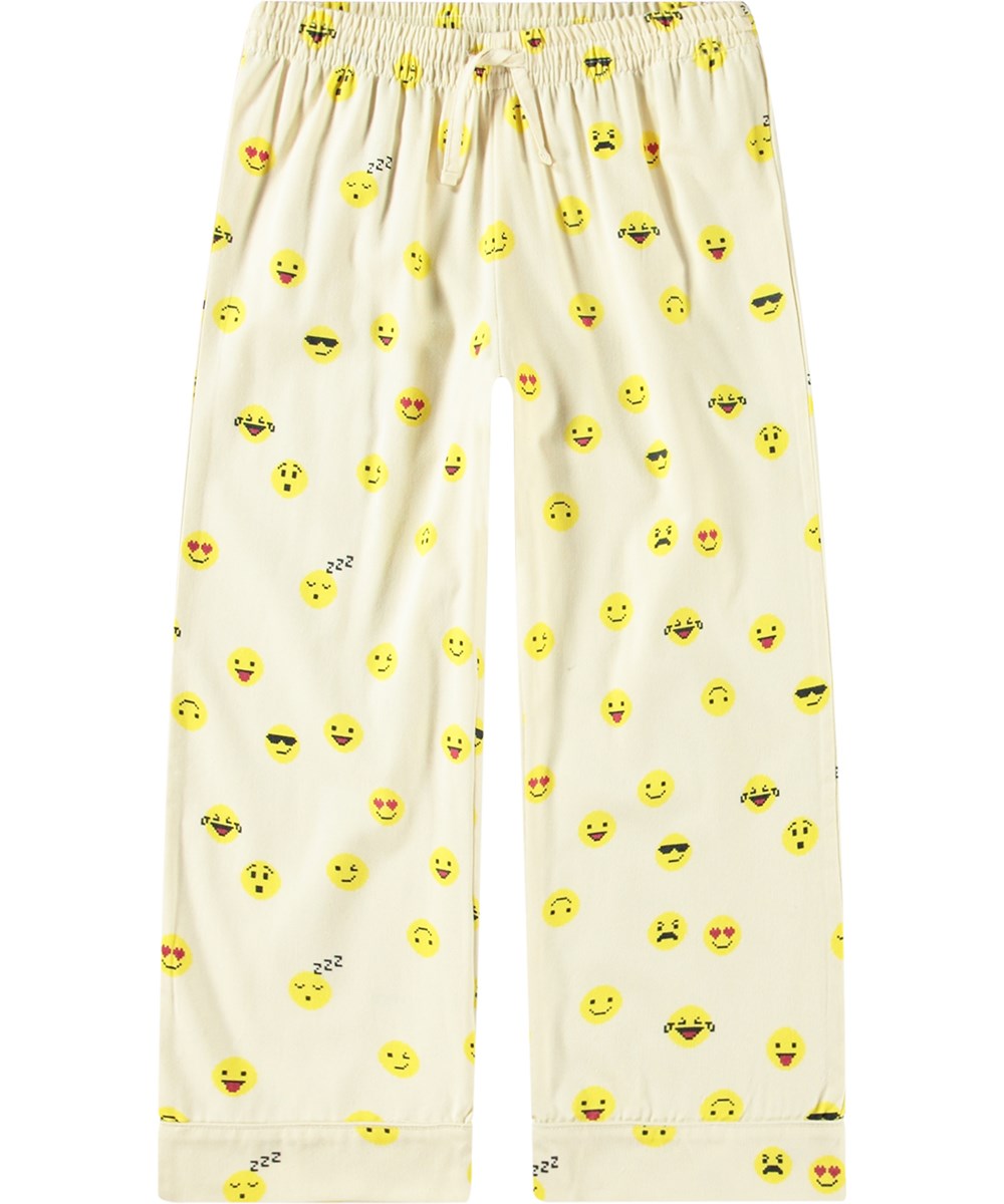 Lex - Pixel Emojis - Ljus pyjamas i ekologisk bomull med långa byxor och ett mönster av gula pixel-emojis över hela.