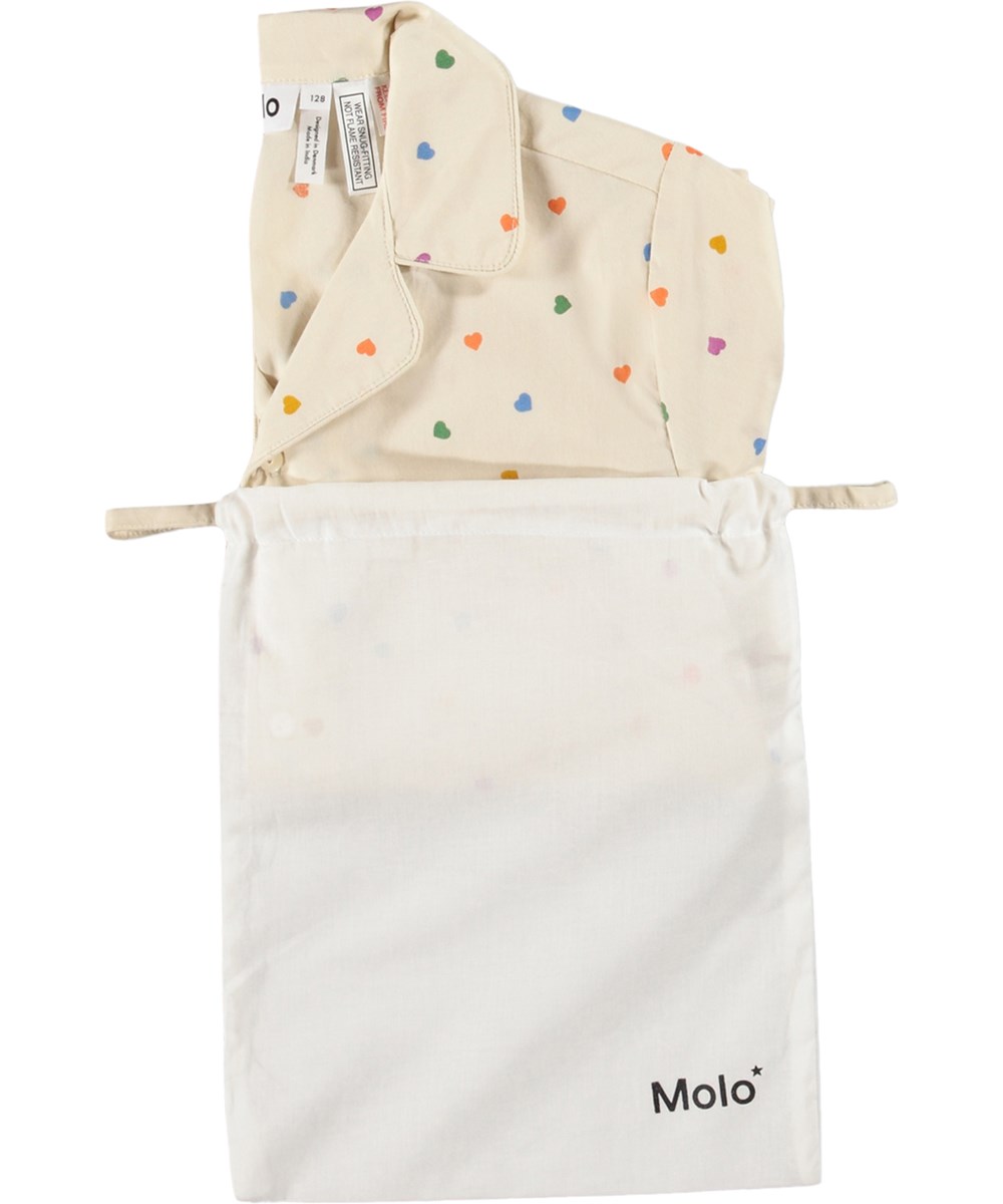 Lexi - Confetti_Rainbow - Beige pyjamaset för barn i ekologisk bomull med mönster