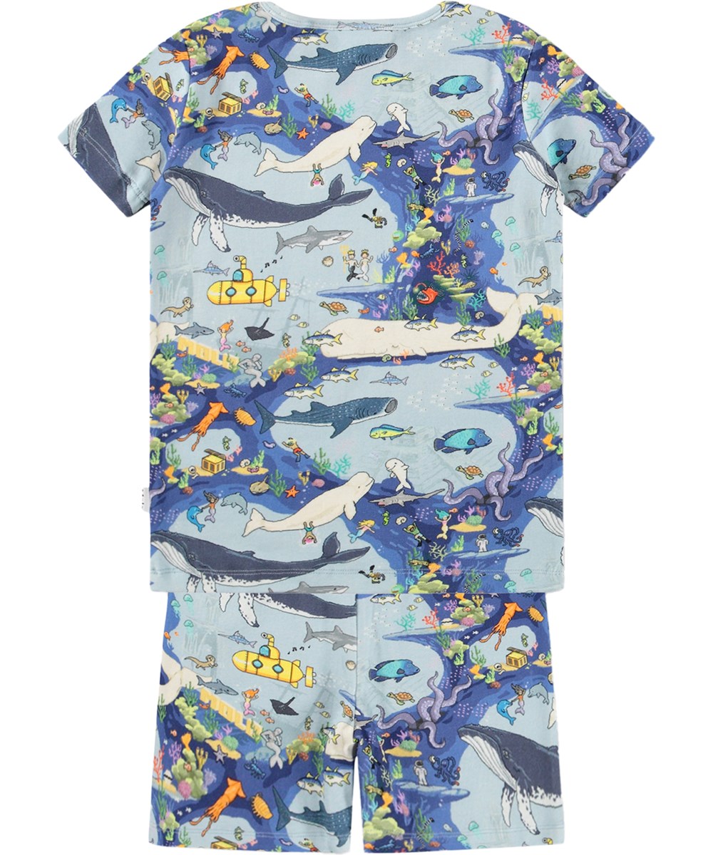 Lou US - Pixel Sea - Blå tvådelad pyjamas för barn i ekologisk bomull med mönster