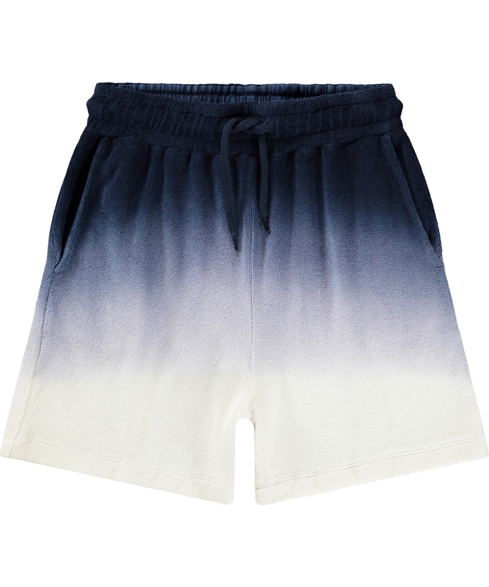 Abay - Sailor - Blå shorts för barn med dip-dye-effekt i ekologisk bomullsfrotté.