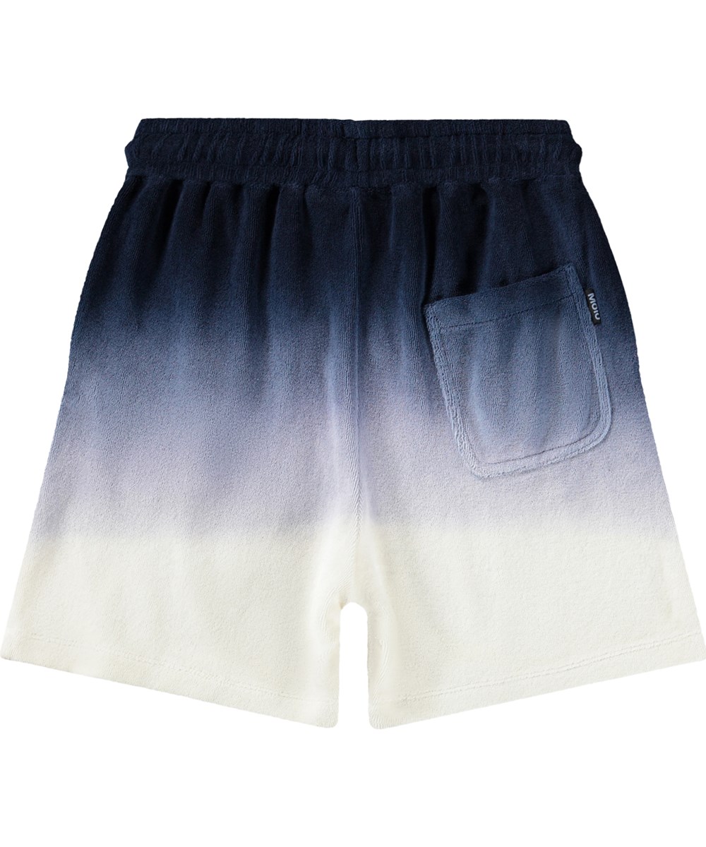 Abay - Sailor - Blå shorts för barn med dip-dye-effekt i ekologisk bomullsfrotté.