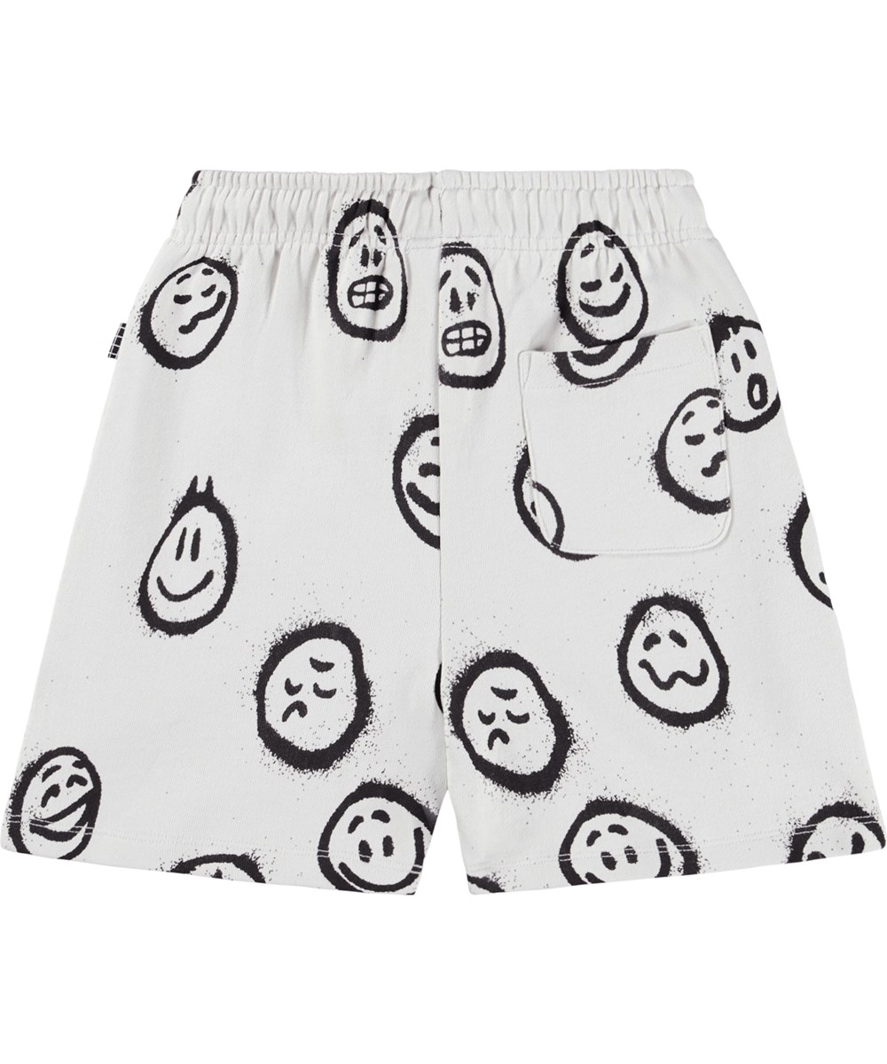Adian - Different Moods - Off-white shorts för barn tillverkade av ekologisk bomull med tryck.