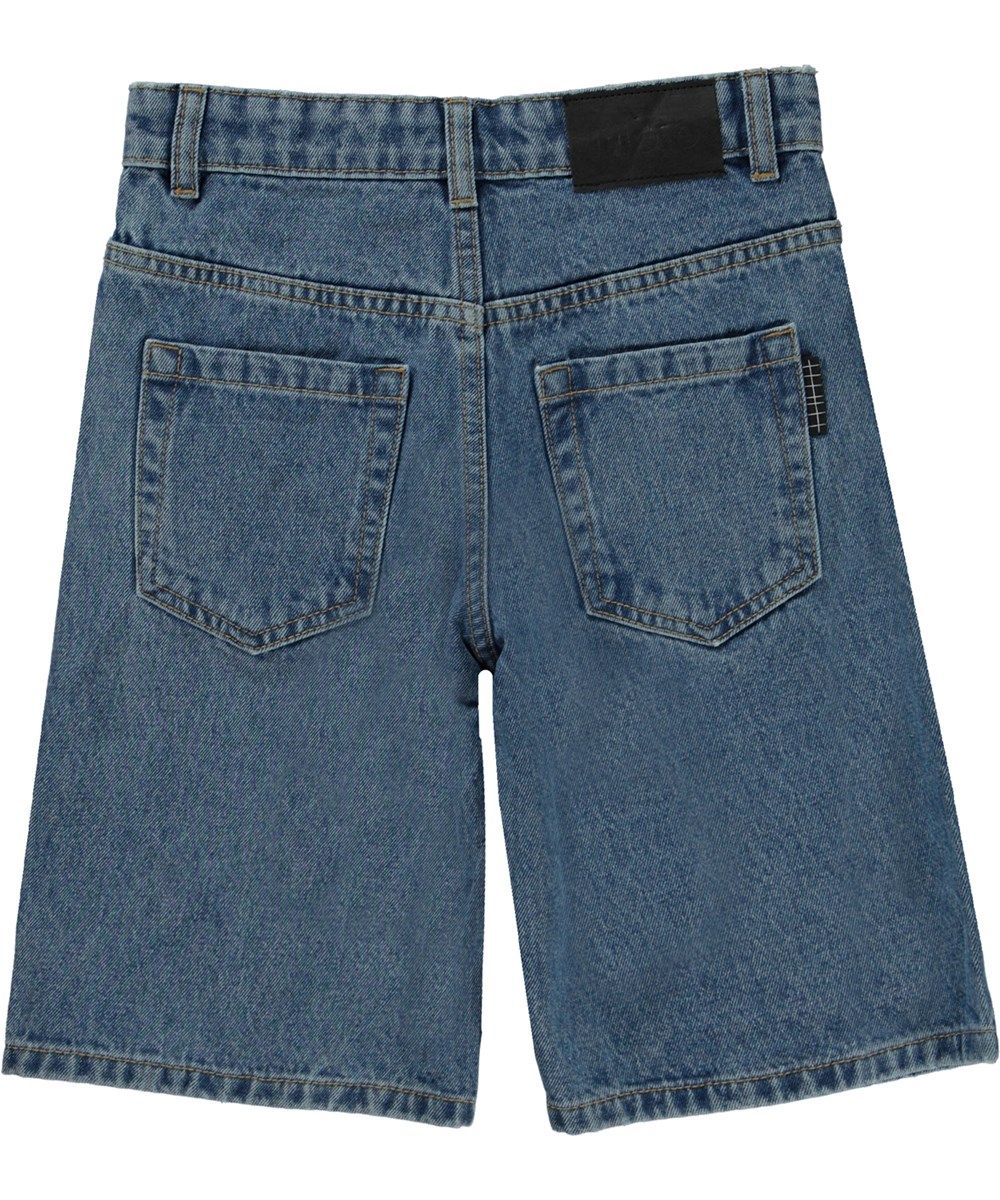 Art - Stone Denim - Knälånga jeansshorts i mellanblå tvätt.