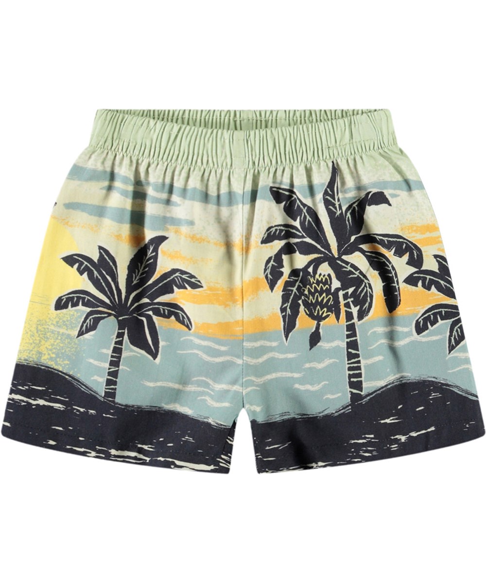 Solar - Palm Babynanas - Shorts med härligt palmmönster i ekologisk bomull för baby.