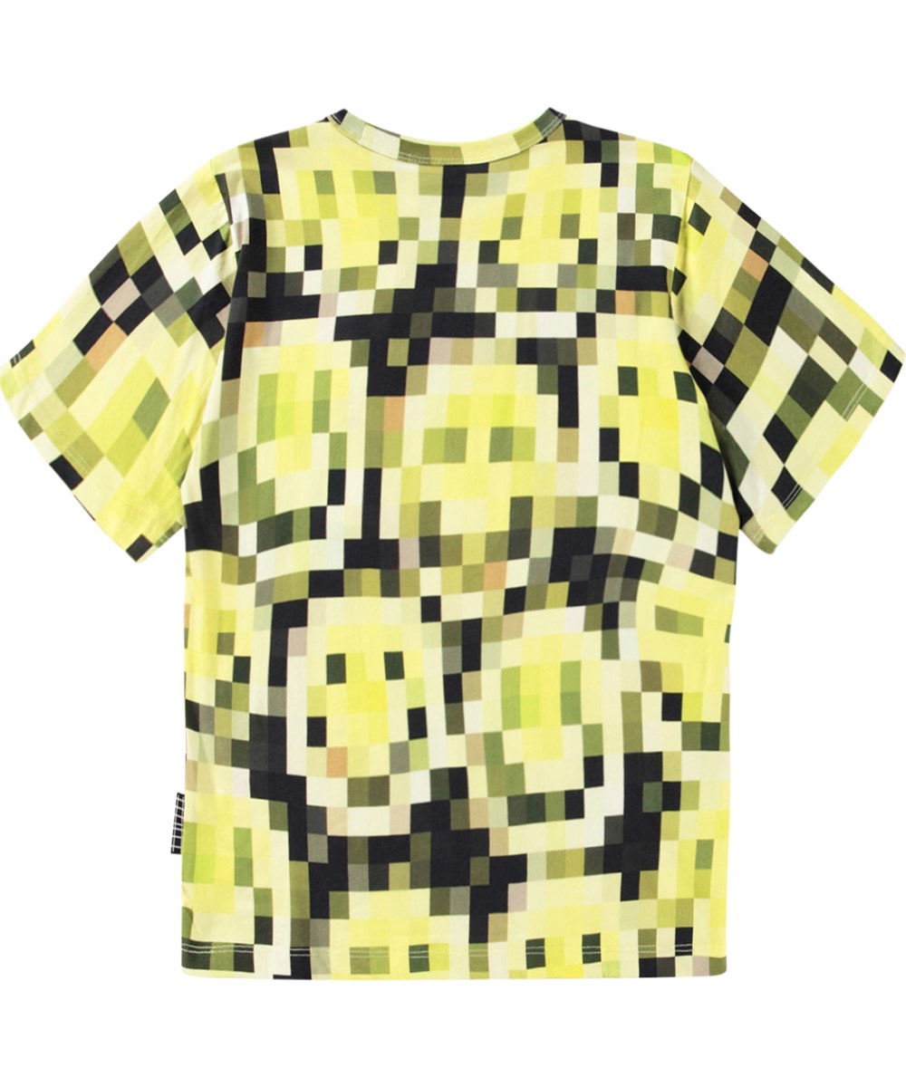 Riley - Pixelated Smiles - Gul och svart T-shirt med ett mönster av smileys över hela.