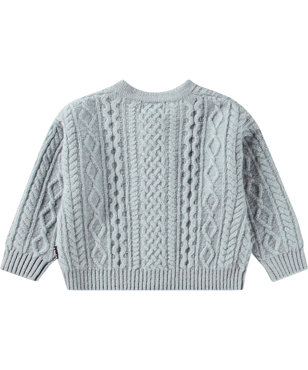 Breeze - Dusty Blue - Ljusblå stickad kofta i ull för barn med flätstickning.