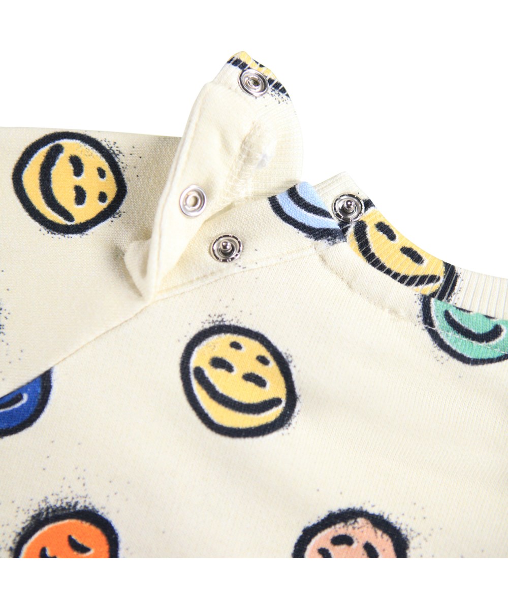 Disc - Multi Moods - Råvit sweatshirt för de minsta i mjuk ekologisk bomull med ansikten i olika humör.