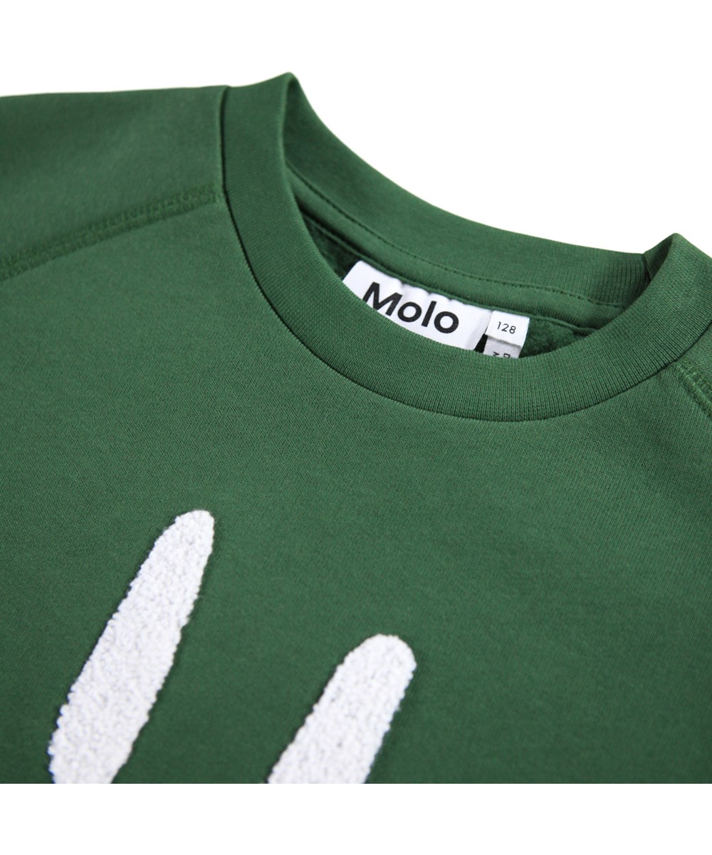 Mike - Pine Tree - Grön sweatshirt för barn i mjuk ekologisk bomull med raglanärmar, ribbade kanter runt halsen, ärmar och midja.