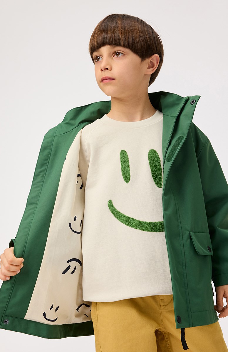 Mike - White Noise - Off-white sweatshirt för barn i mjuk ekologisk bomull med raglanärmar, ribbade kanter vid halsen, ärmar och nederkant på tröjan.