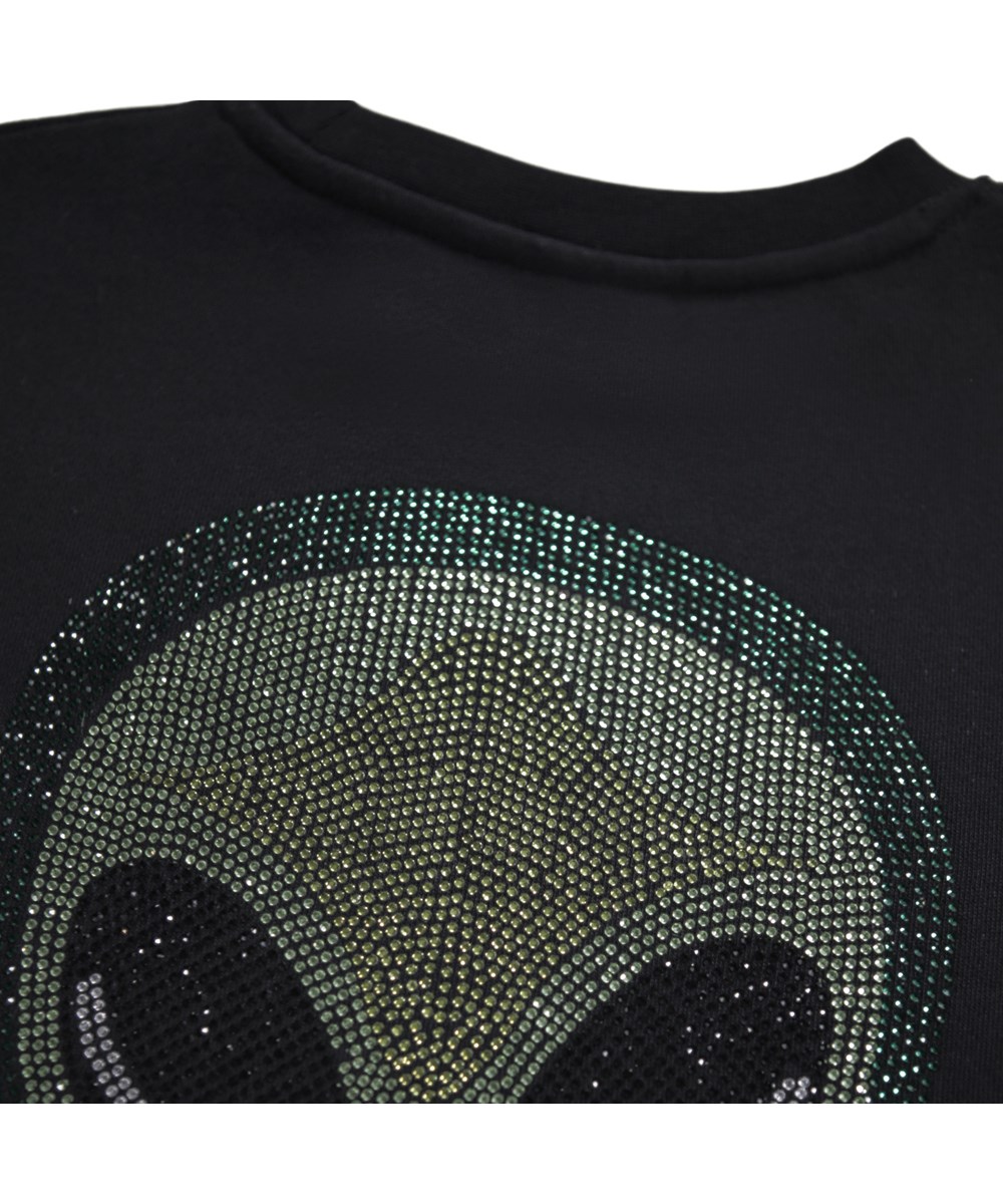 Monti - Bling Alien - Svart sweatshirt för barn i mjuk ekologisk bomull med en paljetterad alien på framsidan och baksidan.