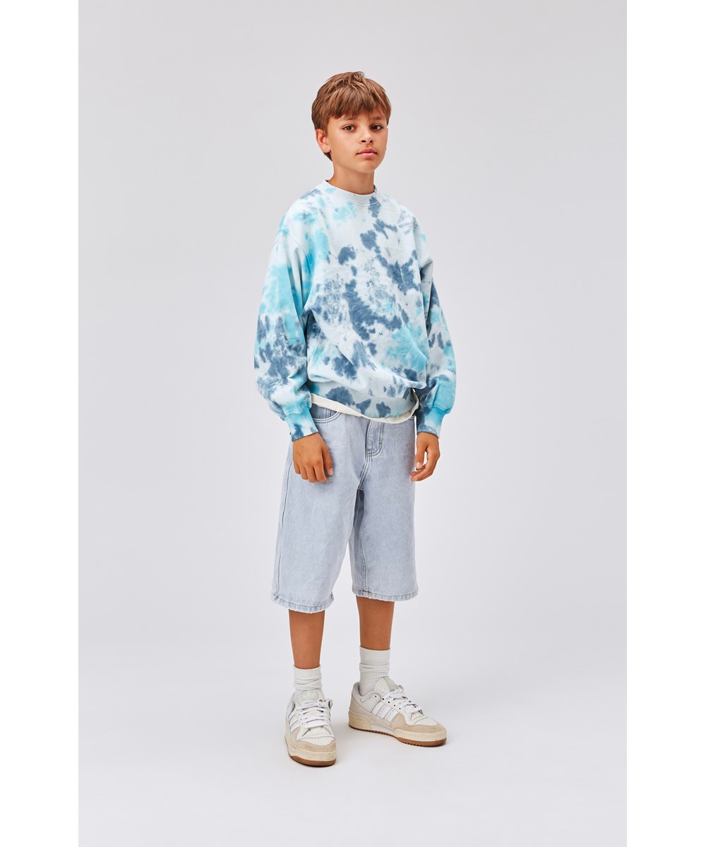 Monti - Water Tie Dye - Unisex sweatshirt i blå med tie-dye.