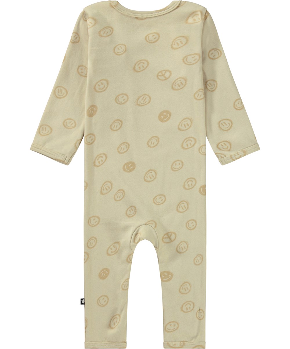 Fenez - Happy Sandy - Beigefarbener Öko-Babyanzug mit Smile-Print