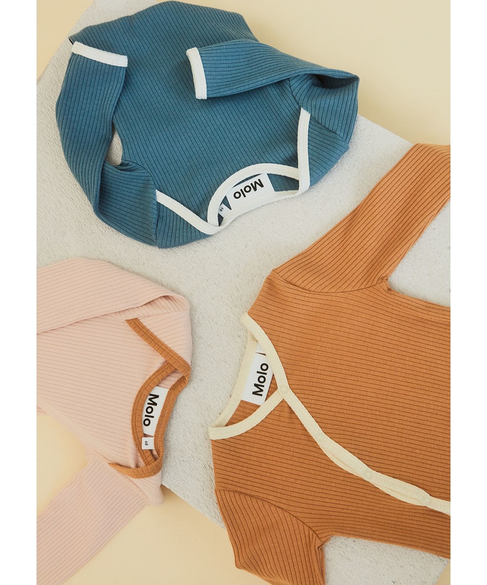 Fellow - Deer - Brown baby bodysuit with light yellow edge tape. 