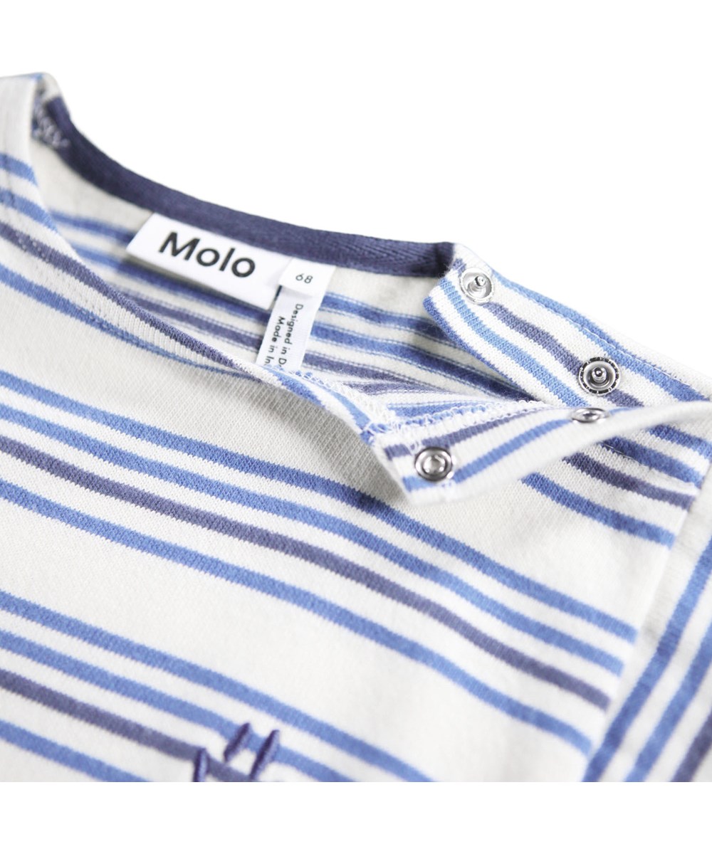 Flint - Sea Sky Stripe - Babypakje gemaakt van biologisch katoen met strepen in blauwtinten.