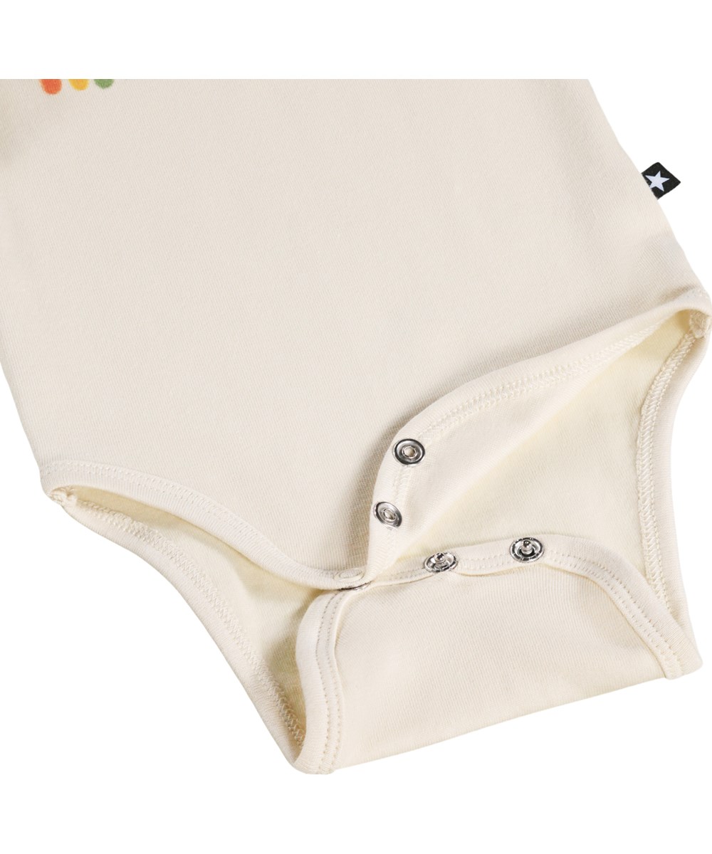 Foss - Little Rainbow - Cream-coloured, long-sleeved bodysuit for the little ones made of organic cotton with a rainbow print 