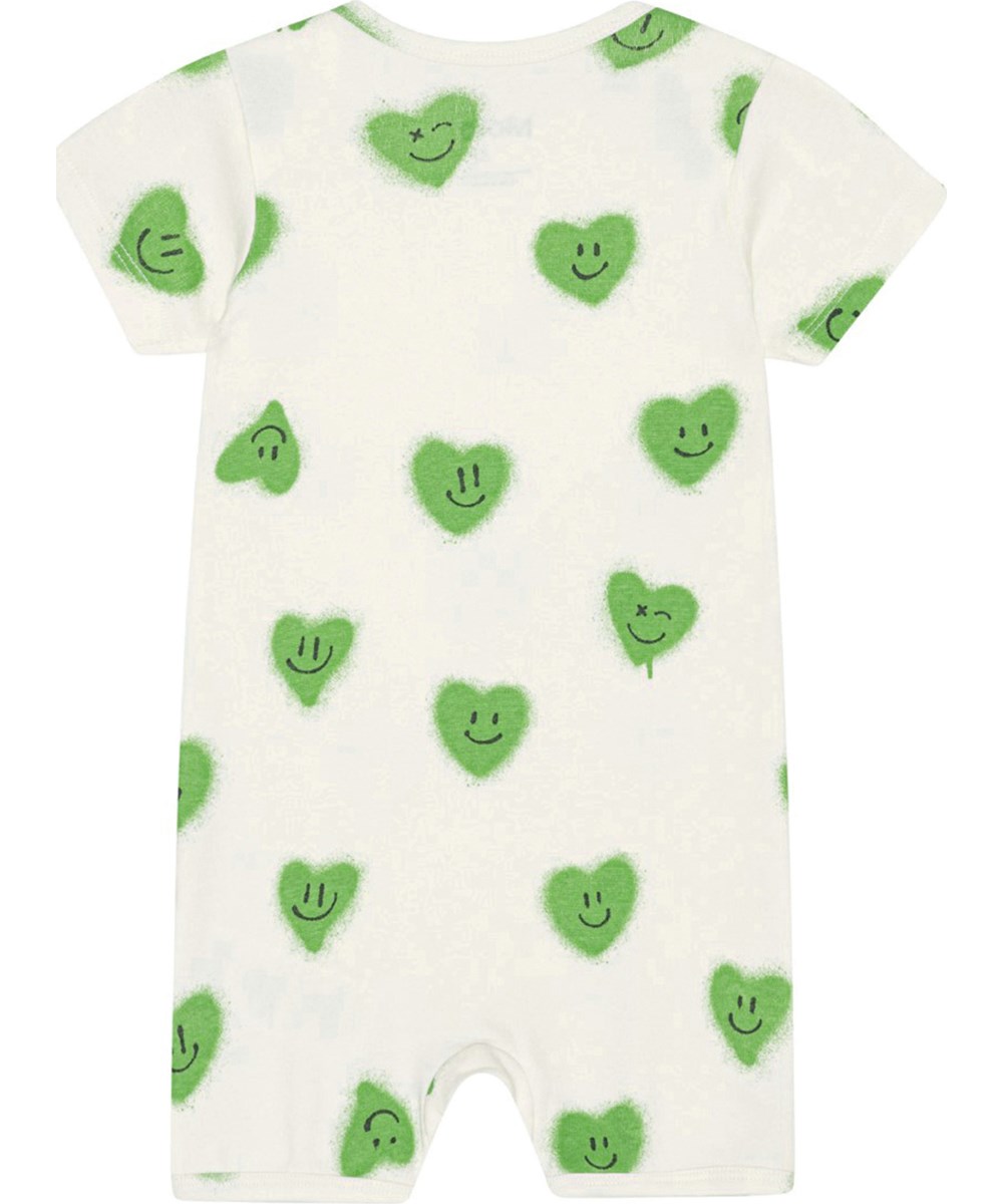 Free - Hearts - Gebroken witte babypakje van biologisch katoen met een print van groene lachende hartjes