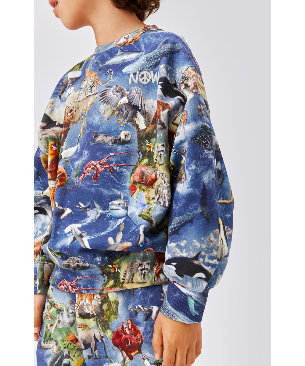 Adan - Amazing Earth - Blauw unisex joggingbroek met dierenprint