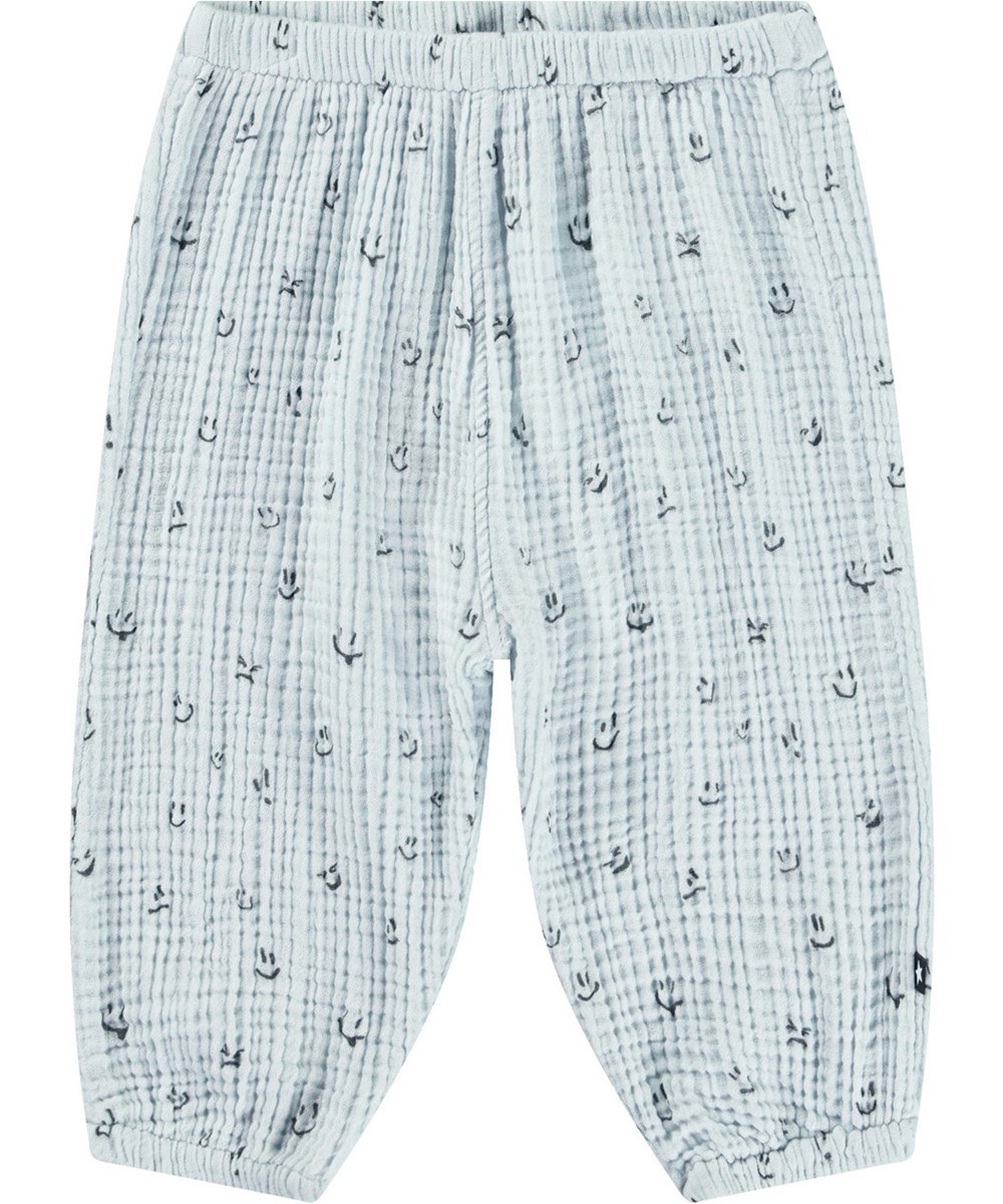 Serene - Moods - Lichtblauwe broek voor baby's en kinderen van biologisch wafelkatoen met een ruimvallende pasvorm en elastische boorden.