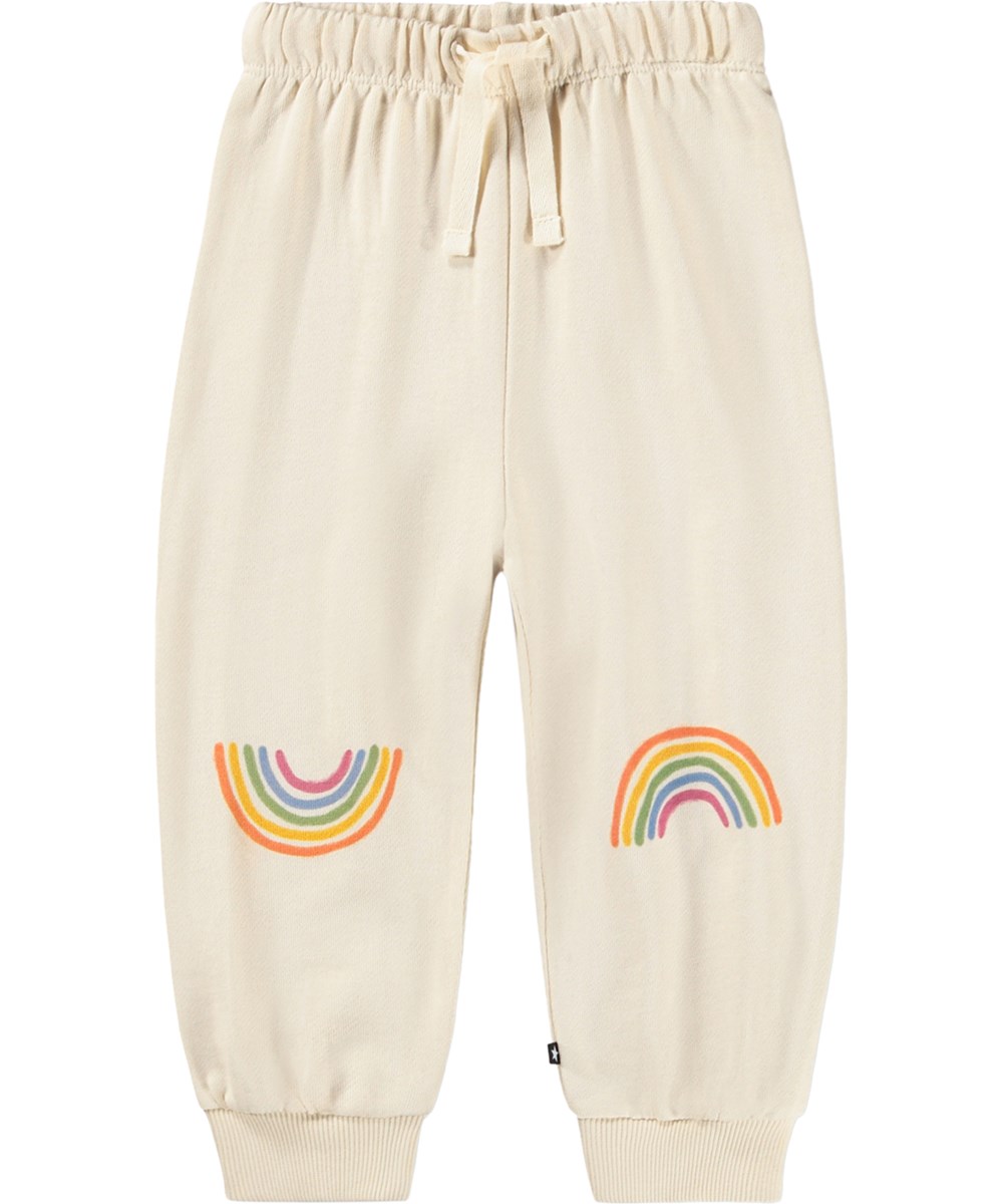 Simeon - Little Rainbow - Zachte, crèmekleurige joggingbroek voor de kleintjes gemaakt van biologisch katoen met een regenboogprint.