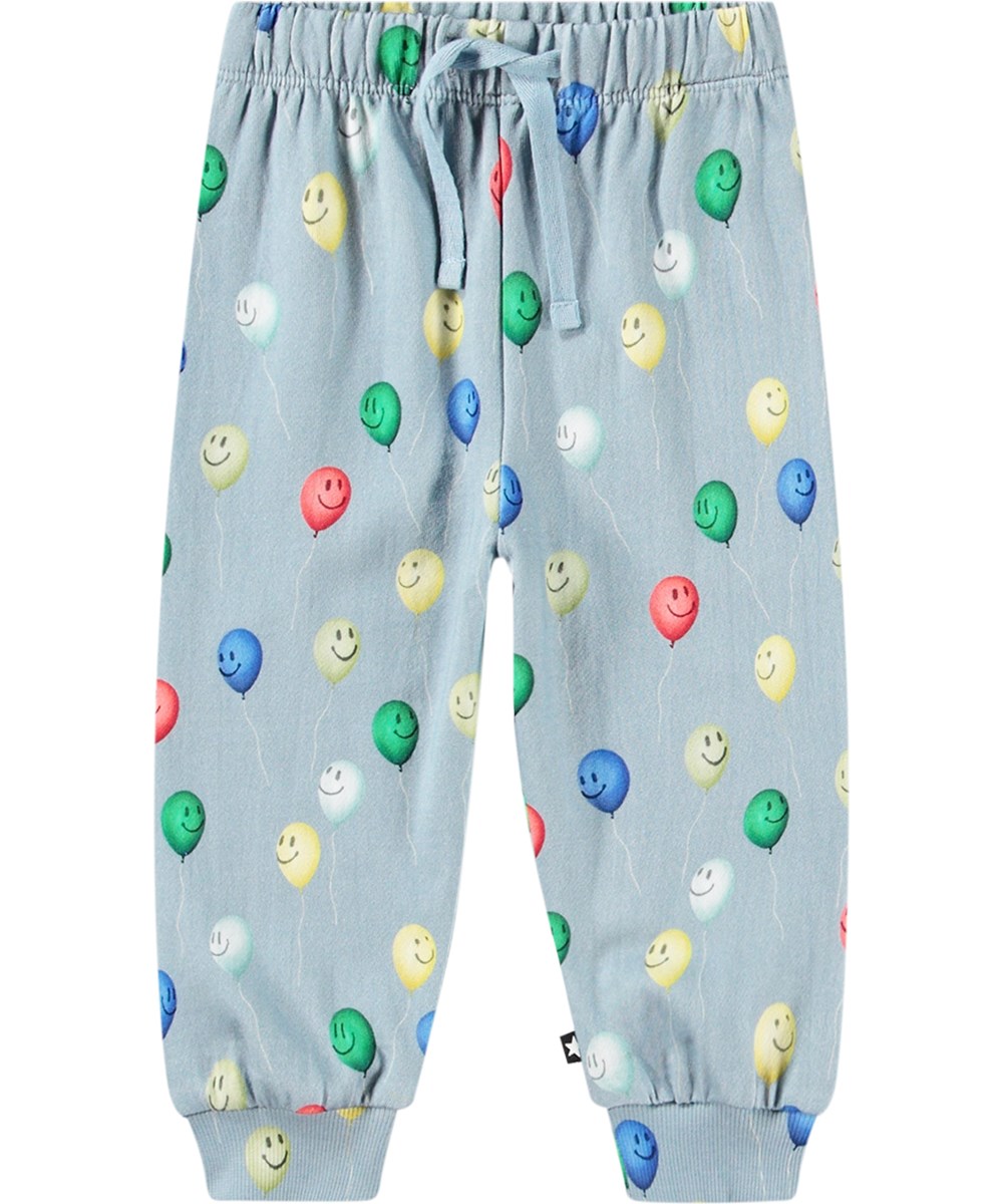 Simeon - Smiling Balloons - Lichtblauwe biologisch katoenen joggingbroek met ballonenprint.