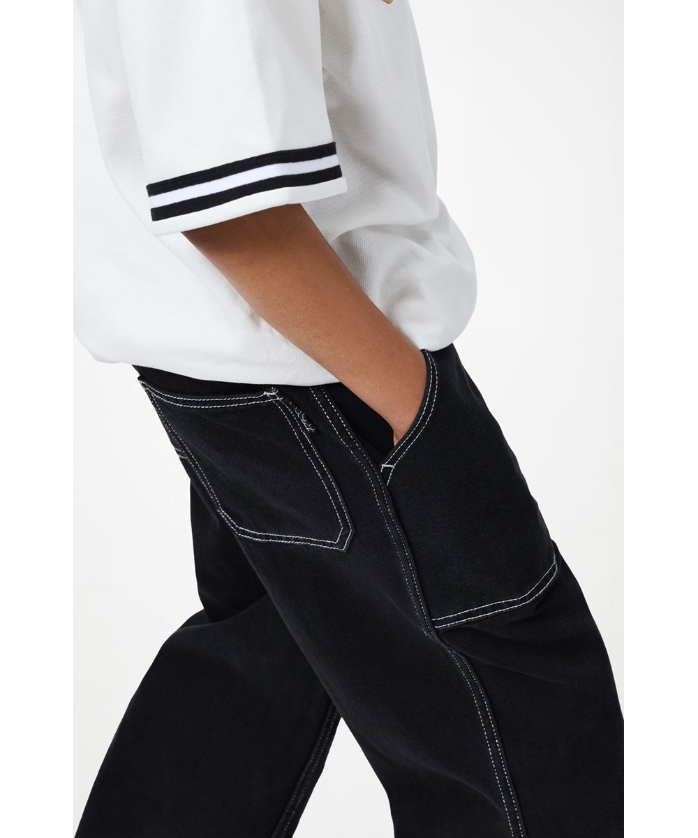 Alton - Washed Black - Sorte jeans i økologisk bomuldsdenim med brede ben til børn