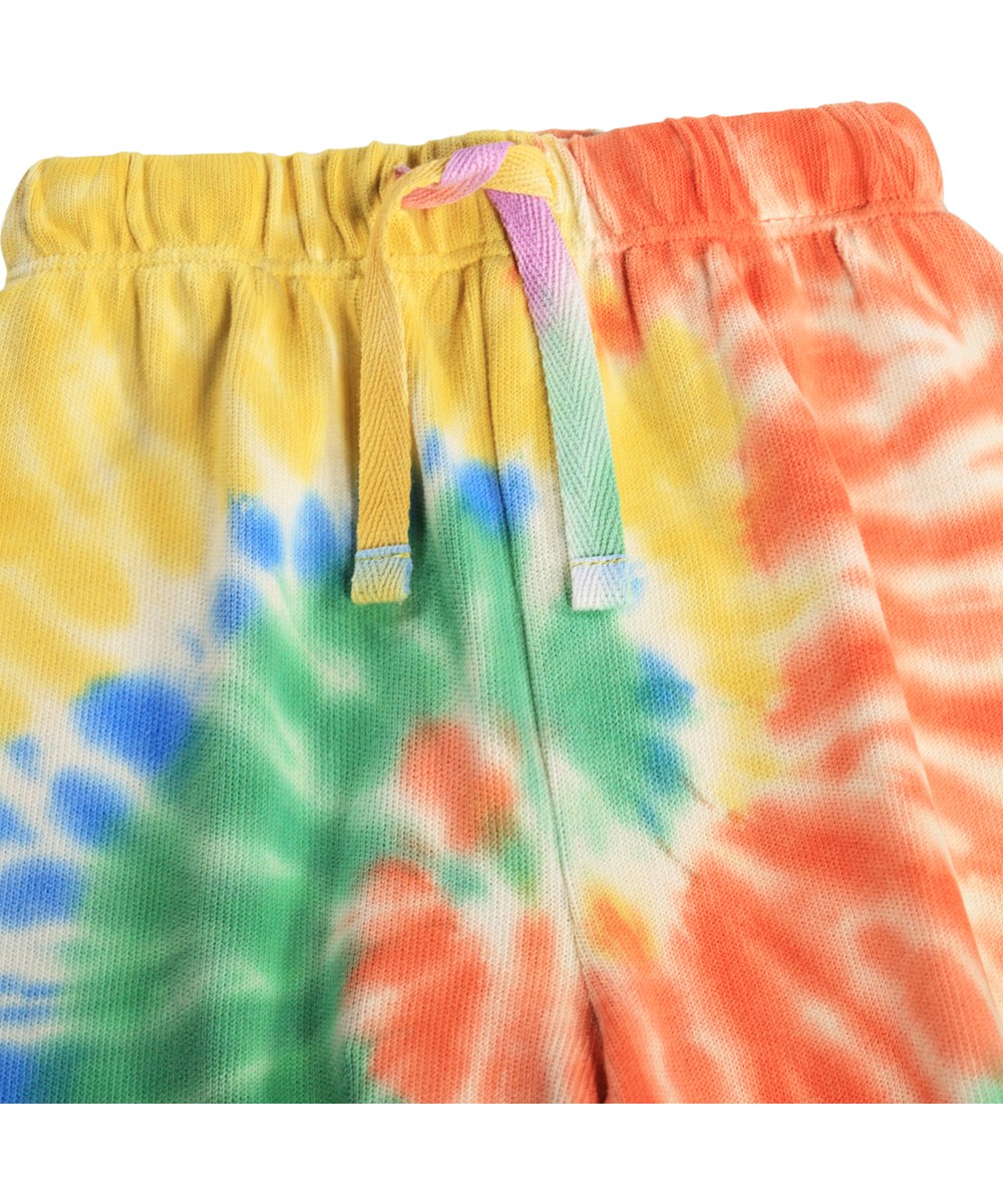 Simeon - Shiny Swirl - Bløde, multifarvede babybukser med tie-dye print i økologisk bomuld