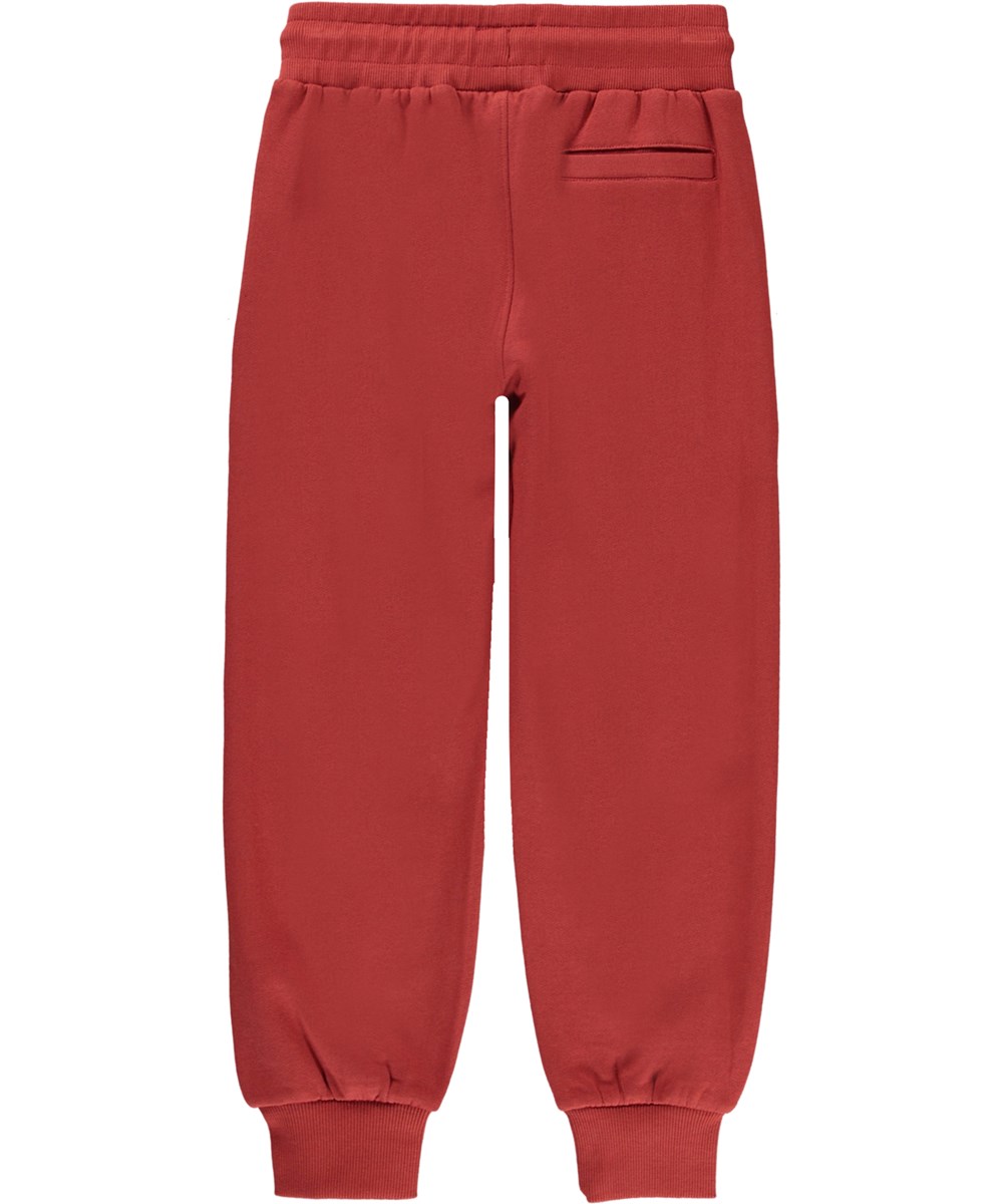 Alvar - Red Ochre - Rote Öko-Jogginghose mit Smiley