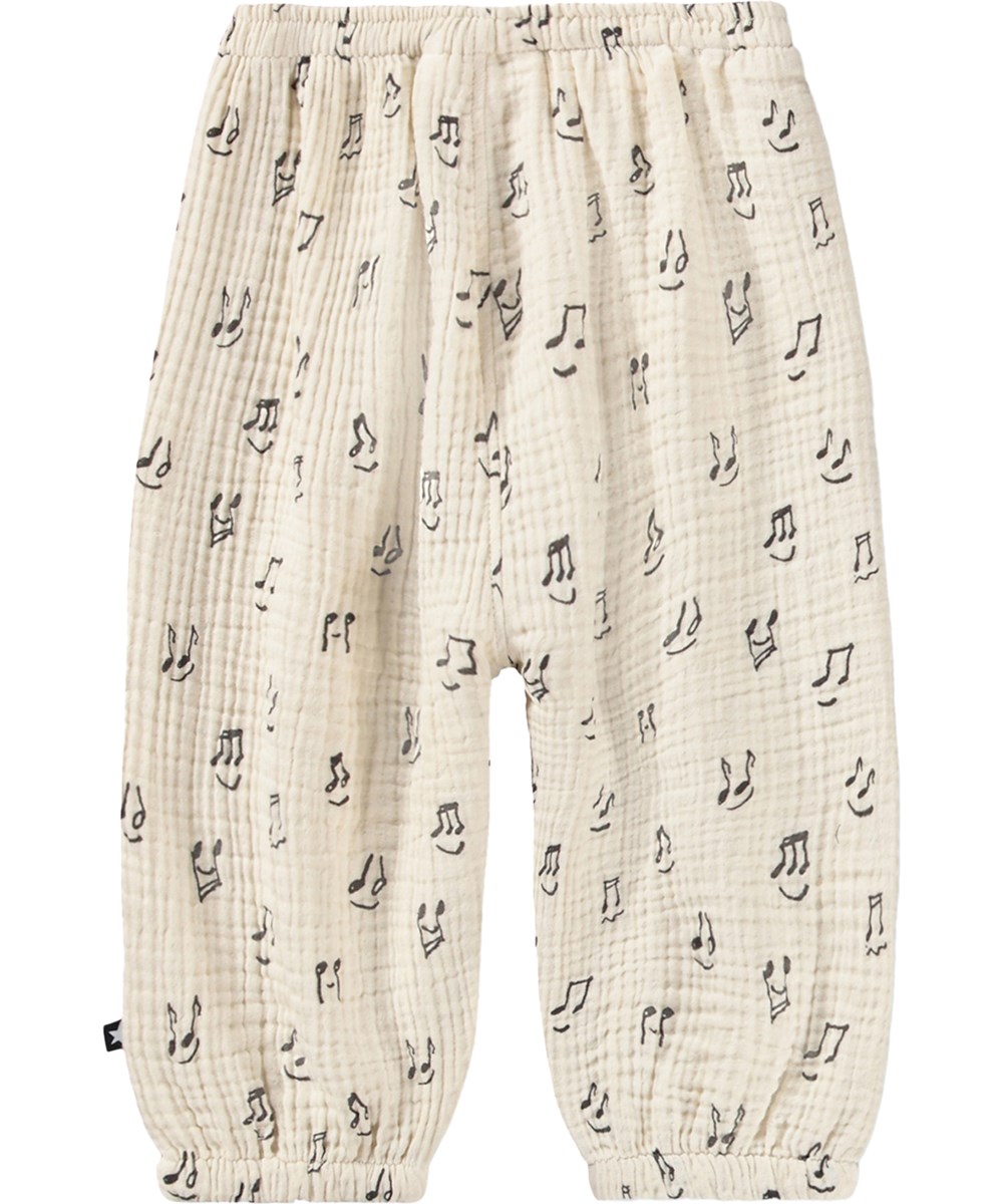 Serene - Happy Notes - Weiche, cremefarbene Hosen für die Kleinen aus Bio-Baumwolle mit Musikdruck
